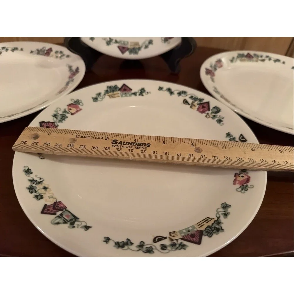 4 Corelle Garden Home Luncheon Plates Birdhouse 8.5”. Good Condition. Ships Fast
